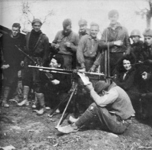 George Orwell as International Brigader in Spain, with the POUM militia at the Aragón front. Orwell is the tallest among the standing figures