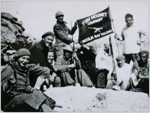 Members of the Lincoln Battalion Machine Gun Company on the Jarama Front, Spring 1937. Courtesy of Dave Smith who is holding the staff of the flag.