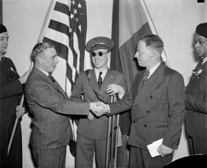 From left to right: Francis J. Gorman, President of the United Textile Workers of America; Lieut. Robert Raven, wounded and blinded in Spain; and Commander Paul Burns in Washington, D.C., Feb 12, 1938 for the First National Conference of the Veterans of the Abraham Lincoln Brigade. Wikipedia Commons.