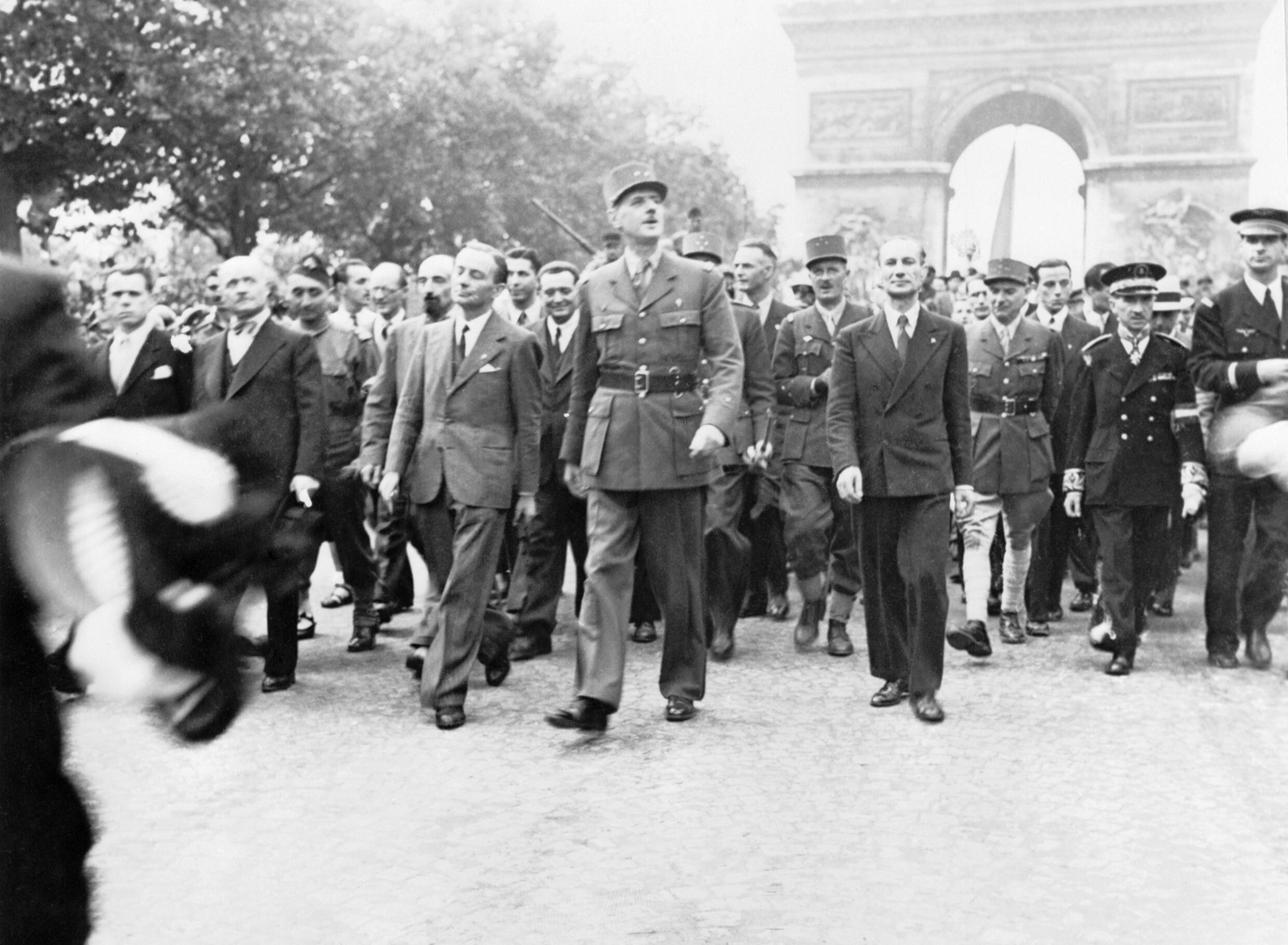 The Liberation of Paris, 25 - 26 August 1944. General Charles de Gaulle and his entourage set off from the Arc de Triomphe down the Champs Elysees to Notre Dame for a service of thanksgiving following the city’s liberation in August 1944. London: Imperial War Museum. Public domain.